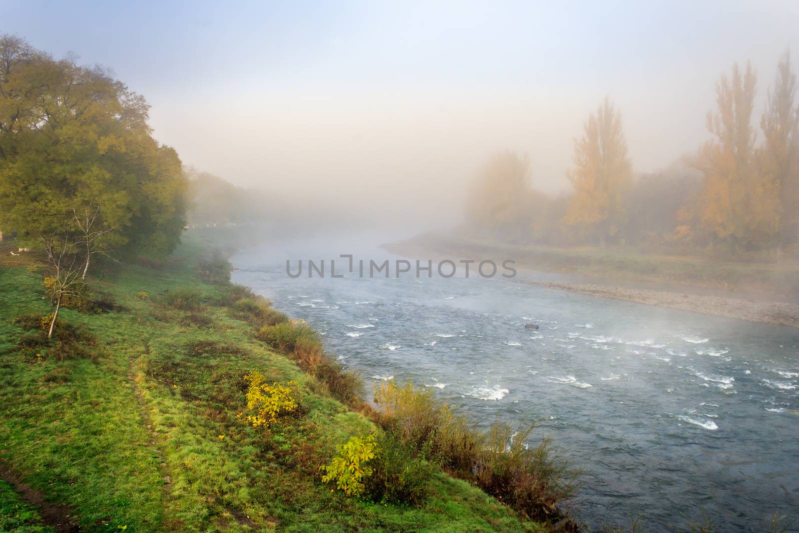 boiling autumn river in fog by Pellinni