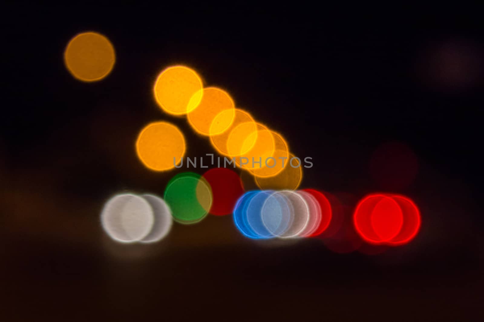 abstract blur of night lights formed a triangle