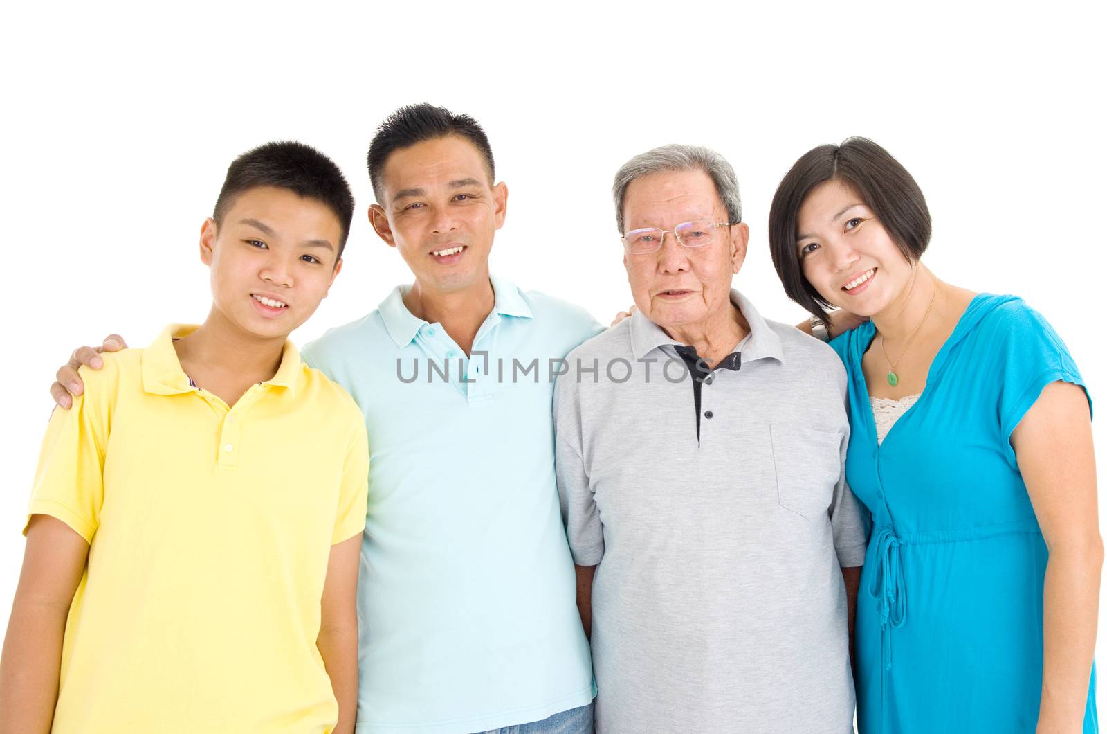 Indoor portrait of beautiful asian 3 generations family over white background