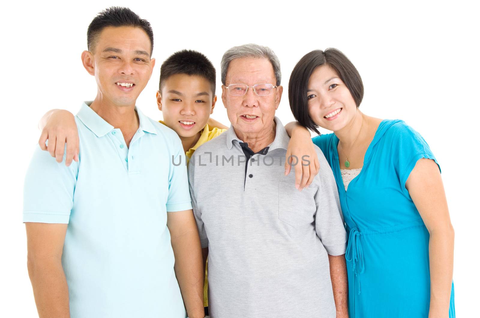 Indoor portrait of beautiful asian 3 generations family over white background