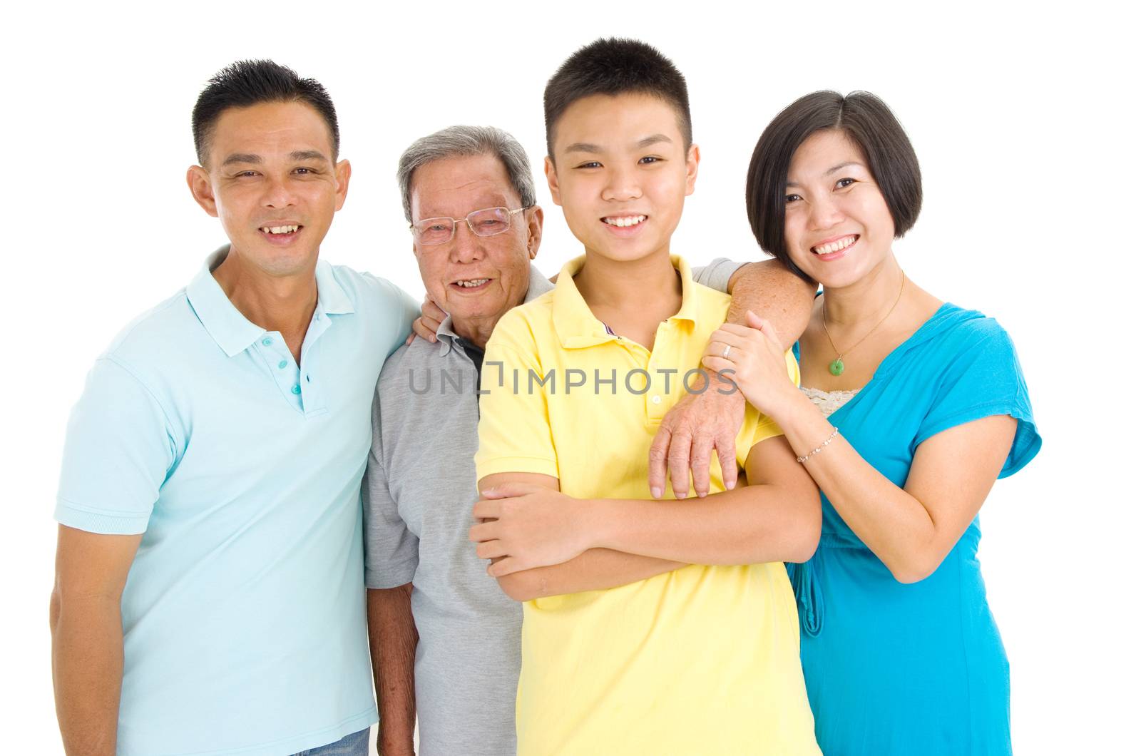 Indoor portrait of beautiful asian 3 generations family over white background