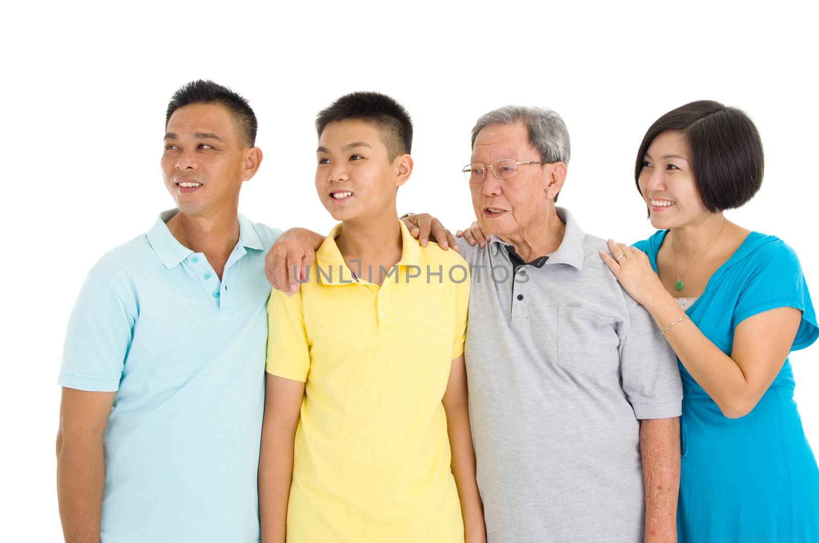 Indoor portrait of beautiful asian 3 generations family over white background