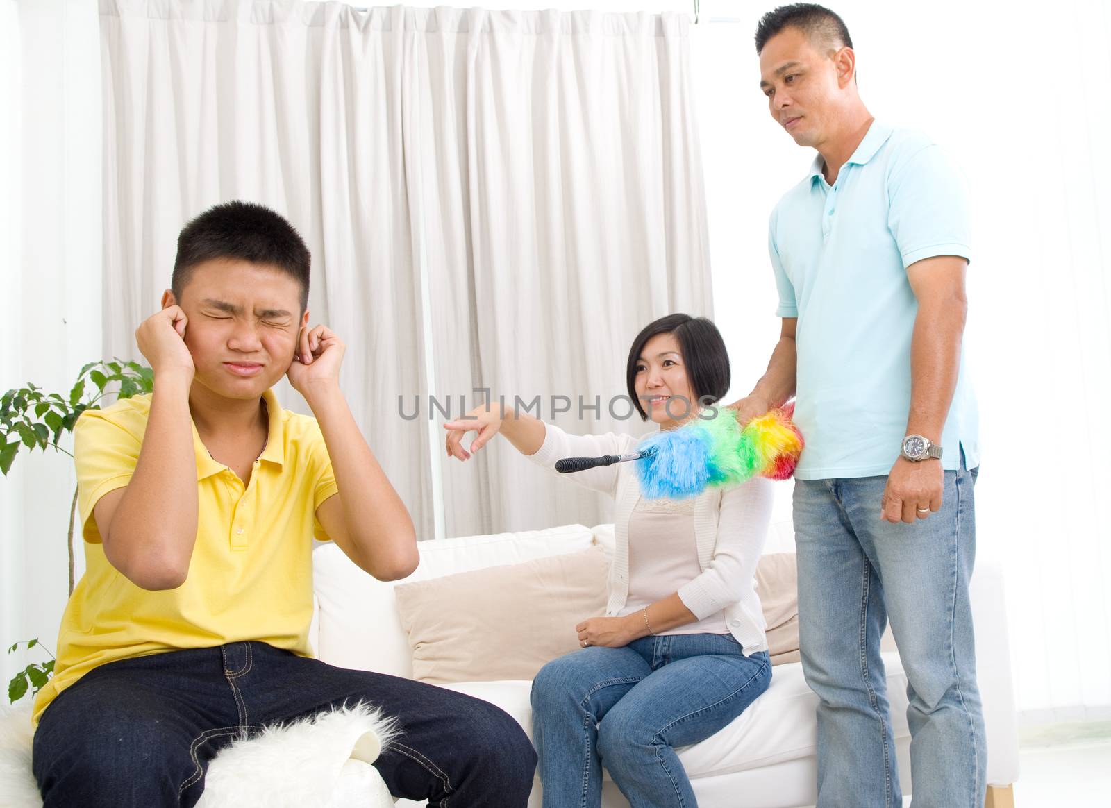 people, misbehavior, family and relations concept - upset or feeling guilty boy and parents at home