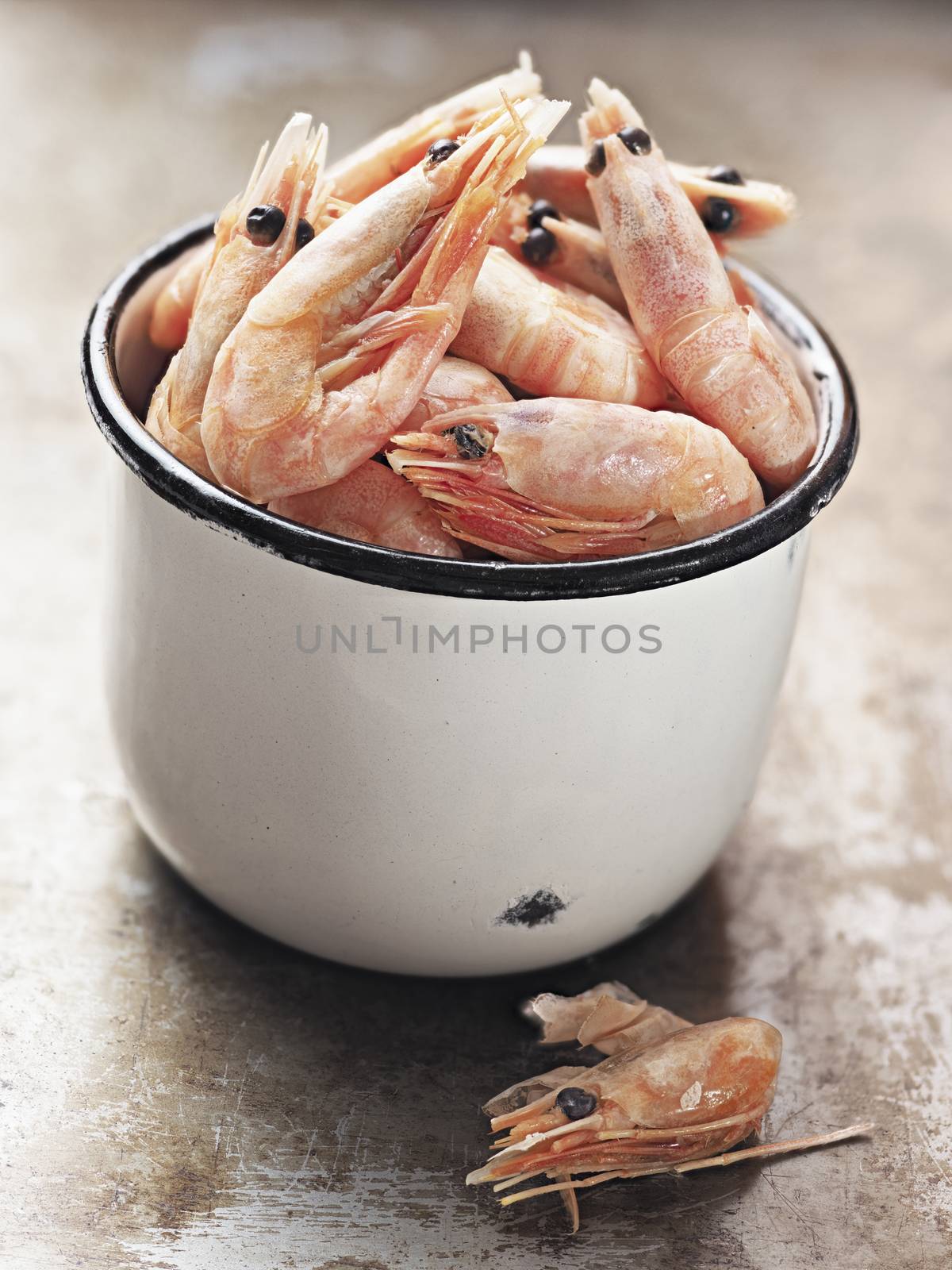 close up of rustic english pub grub pint of prawns