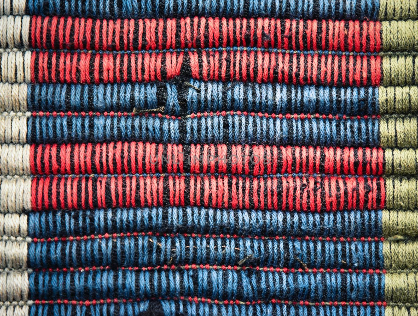 abstract background detail red blue carpet weaving