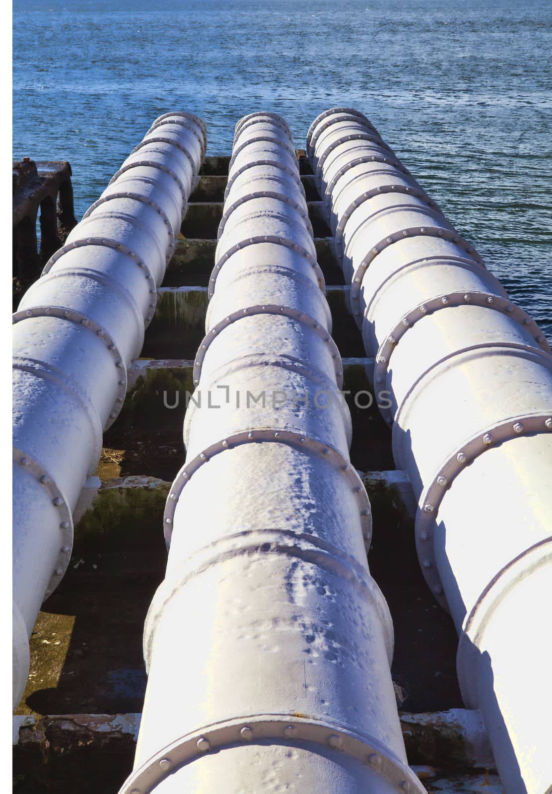 A close up of large sewage pipes