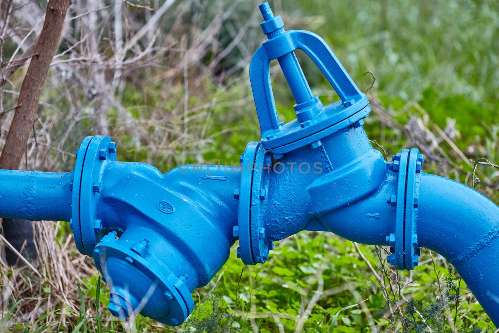 big metal pipe with nature background 