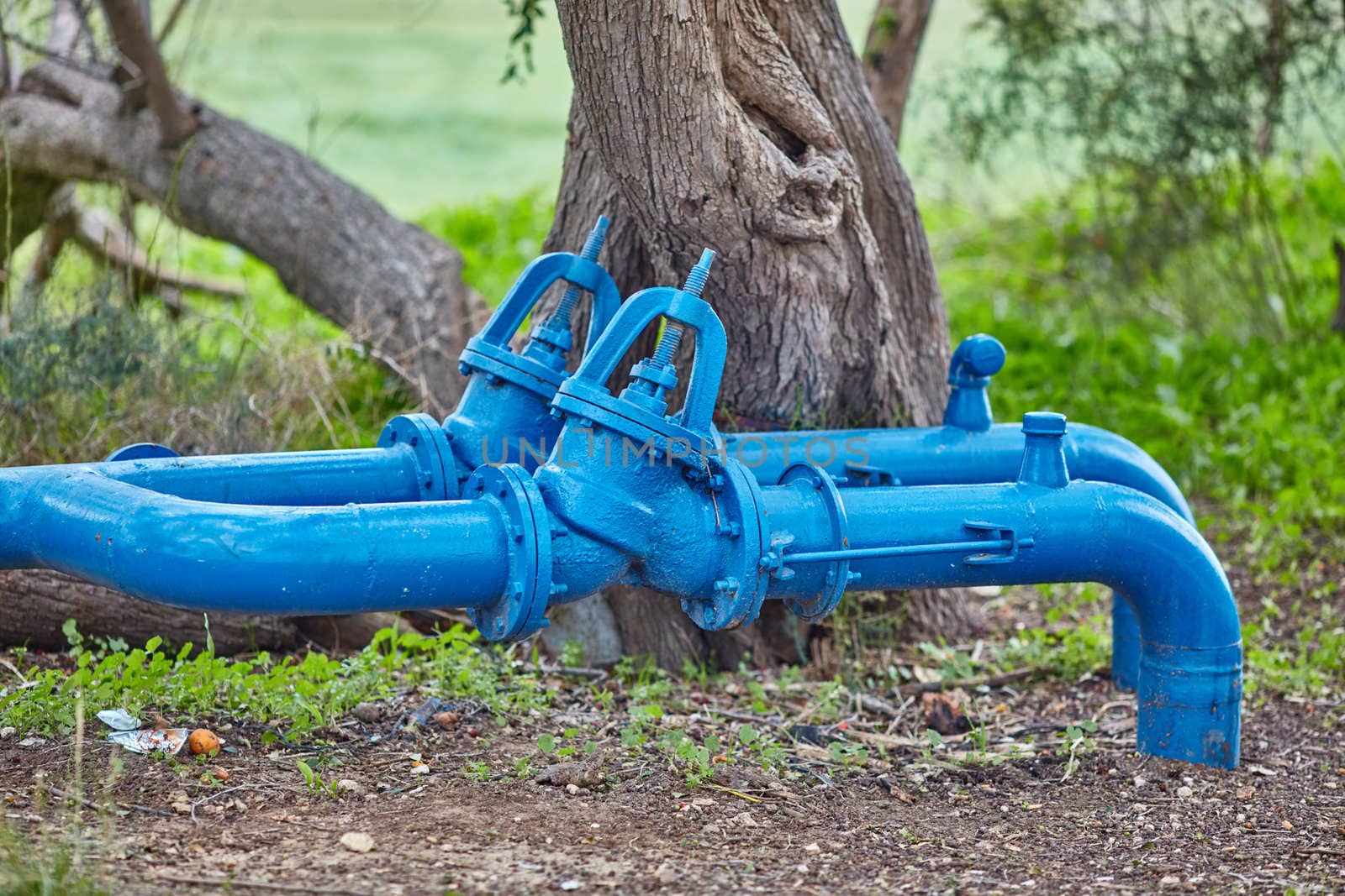 big metal pipe with nature background 