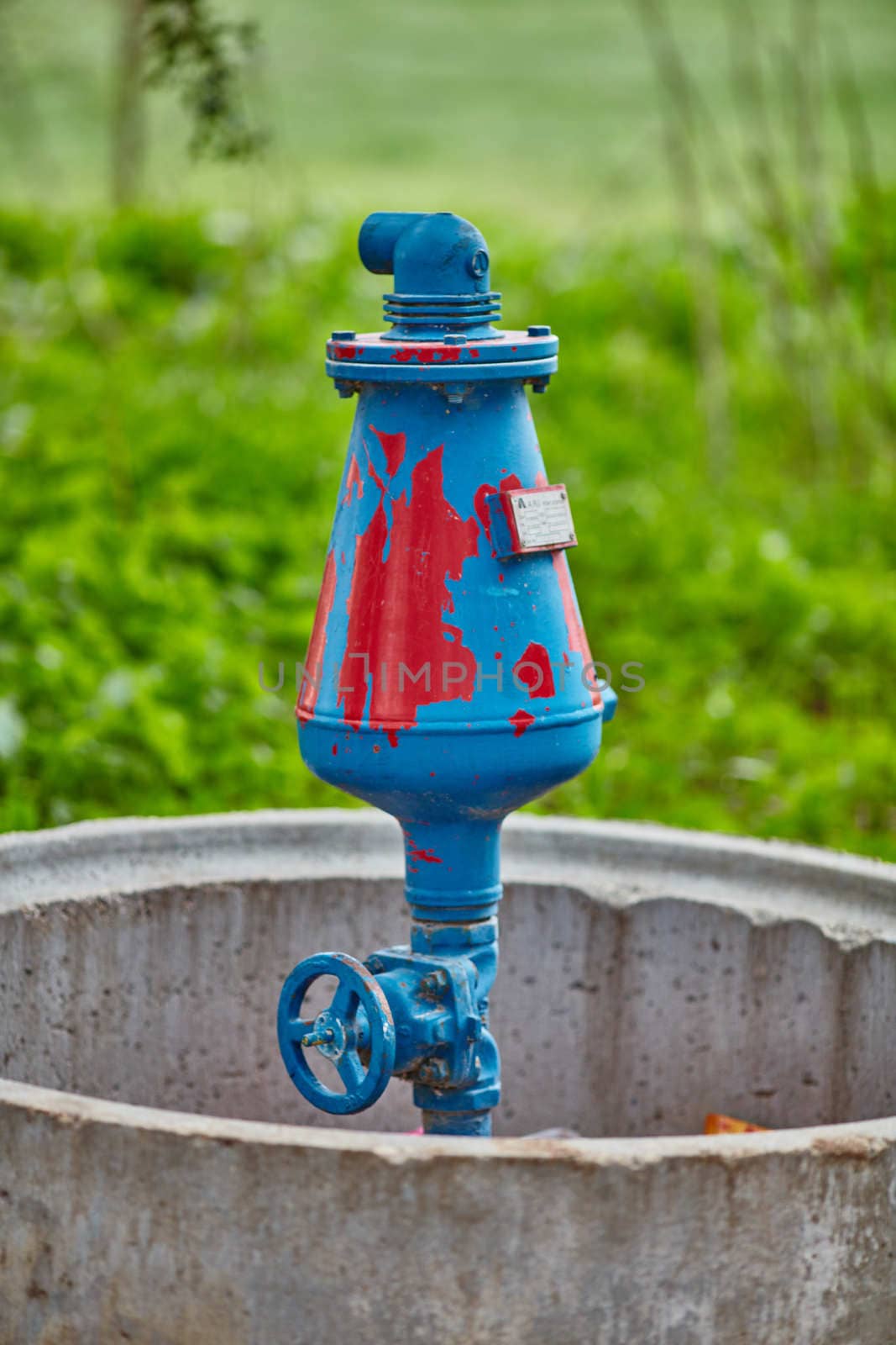 big metal pipe with nature background 