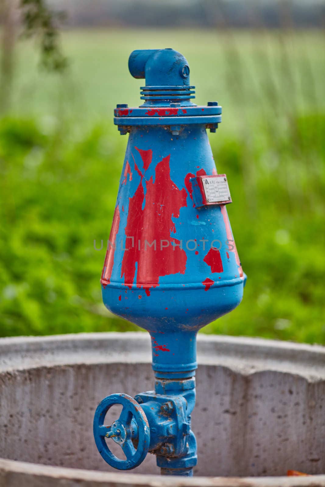big metal pipe with nature background 