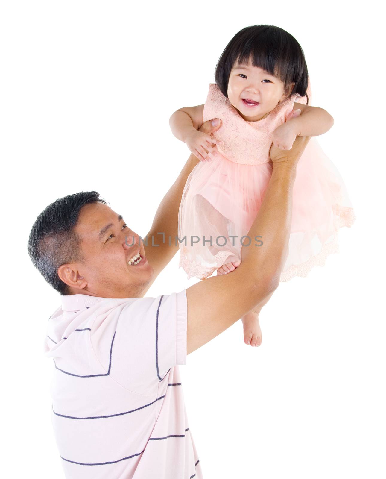 Asian father lifting up her baby