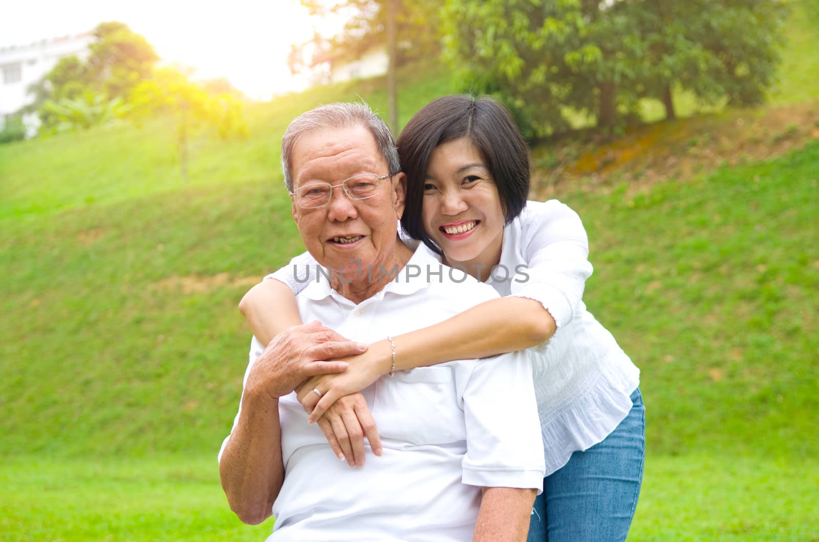 Senior man and daughter. Happy father talking with her daughter.