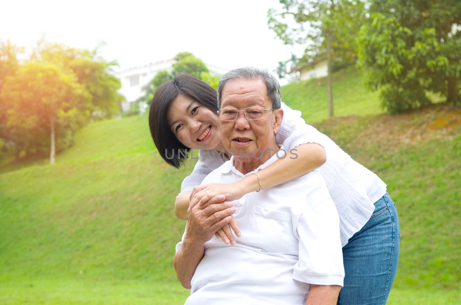 Senior man and daughter. Happy father talking with her daughter.