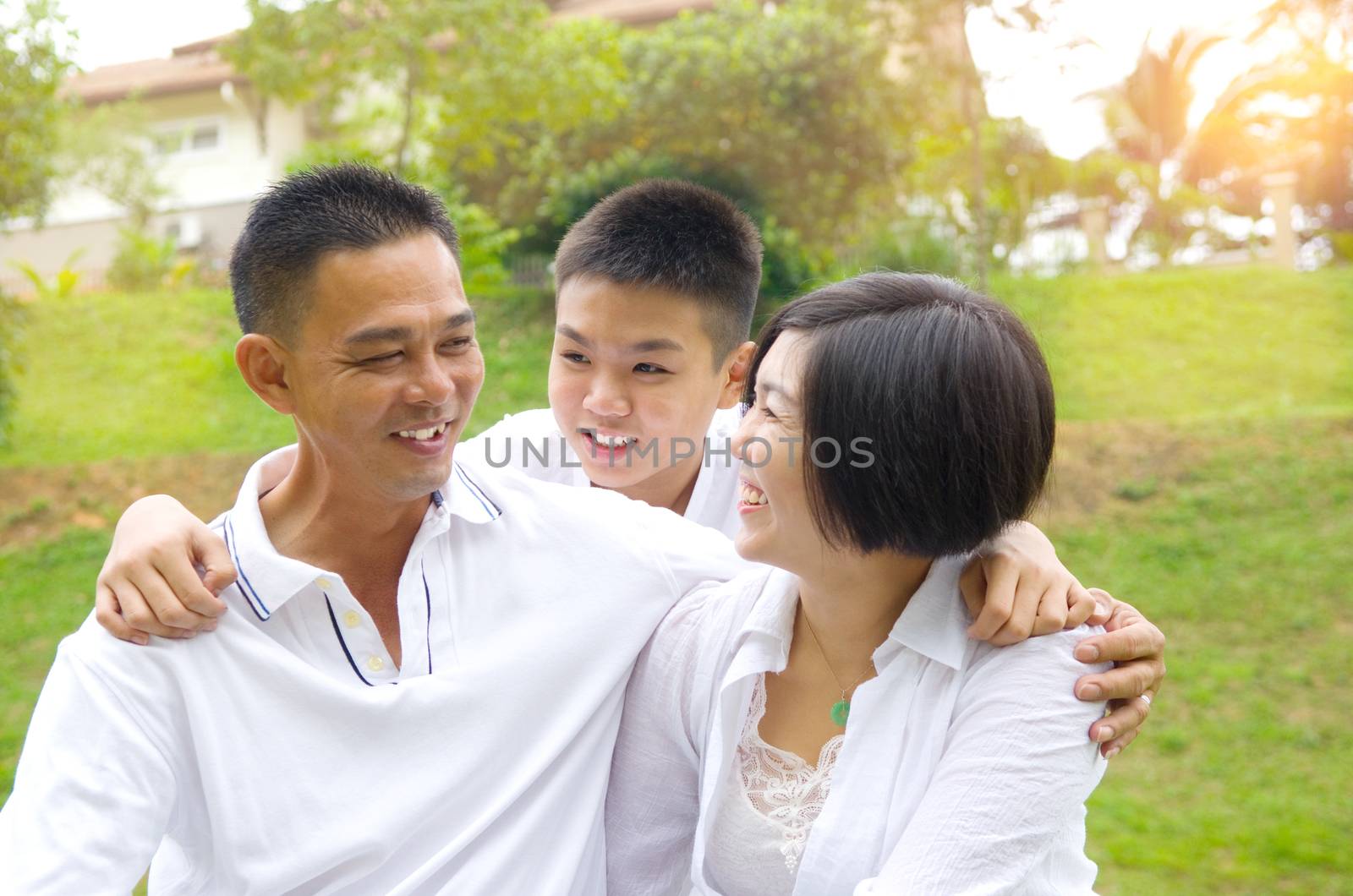 Asian Chinese Family Relaxing at outdoor park 