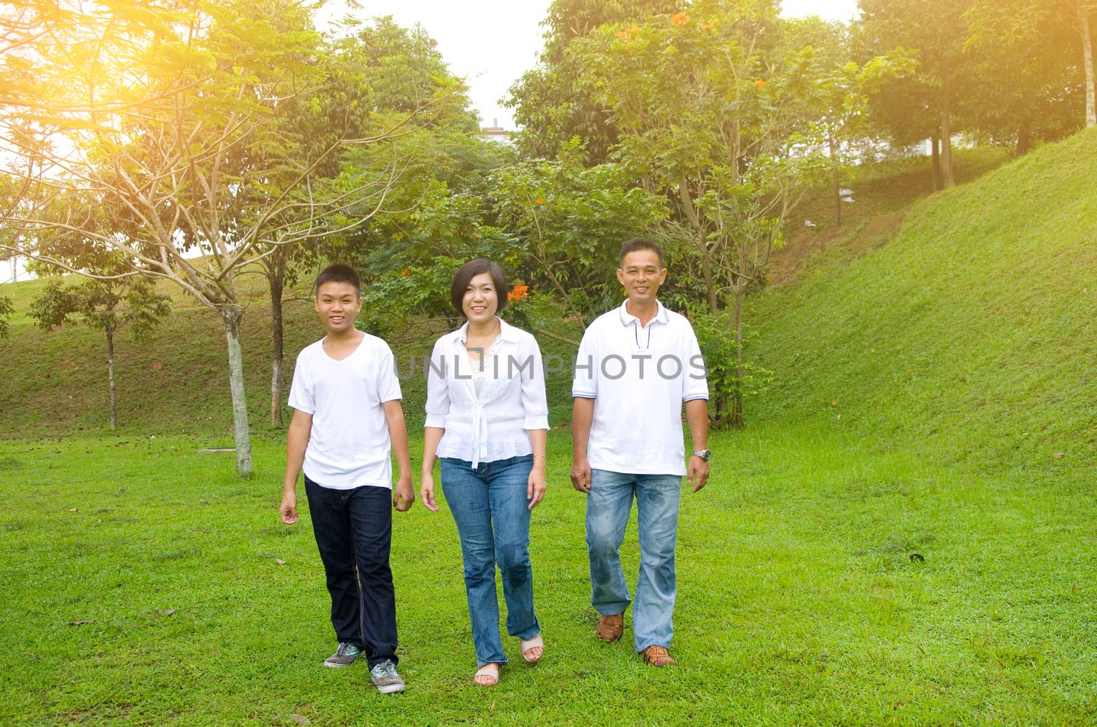 Asian Chinese Family Relaxing at outdoor park 