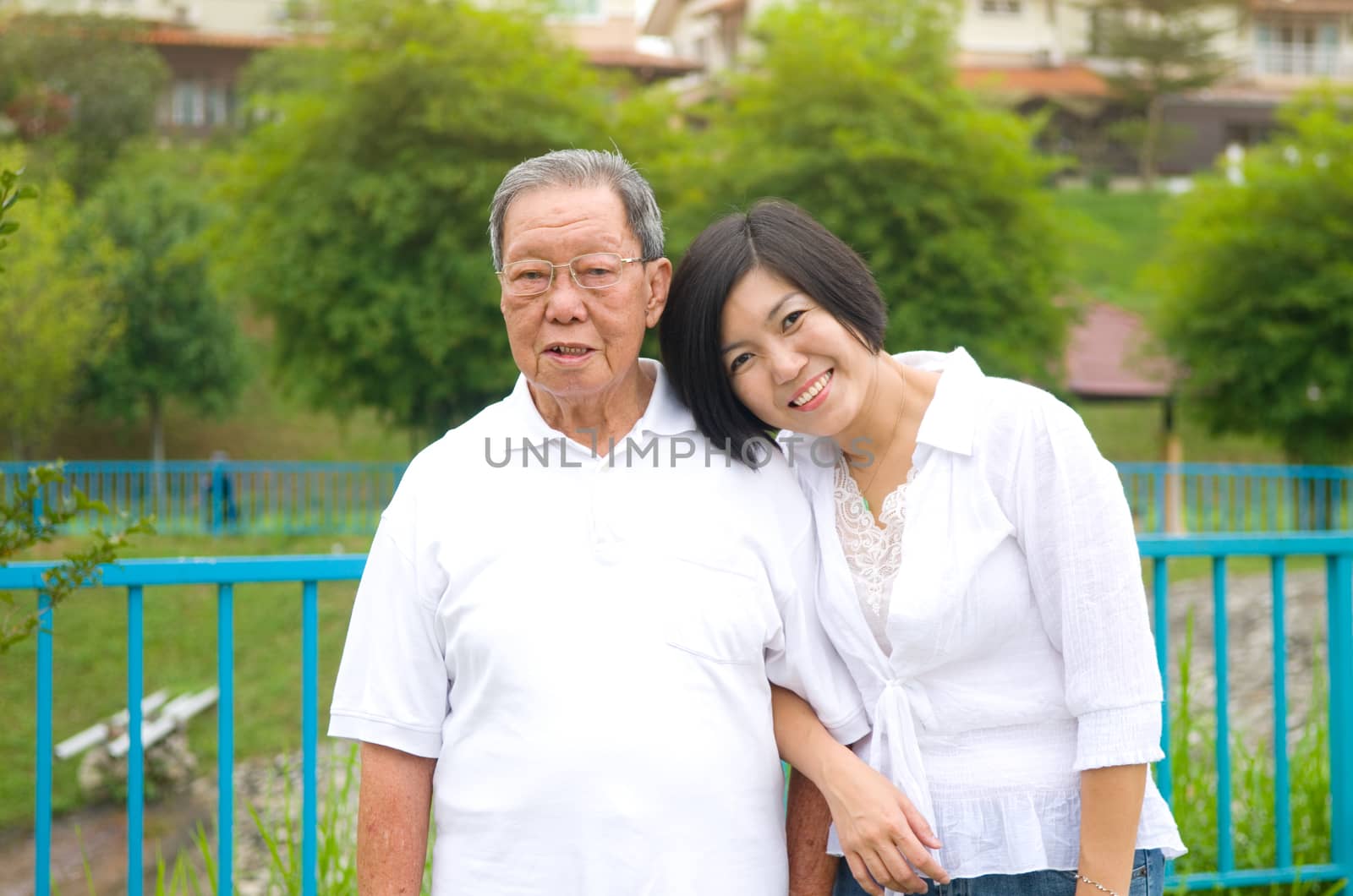 Senior man and daughter. Happy father talking with her daughter.