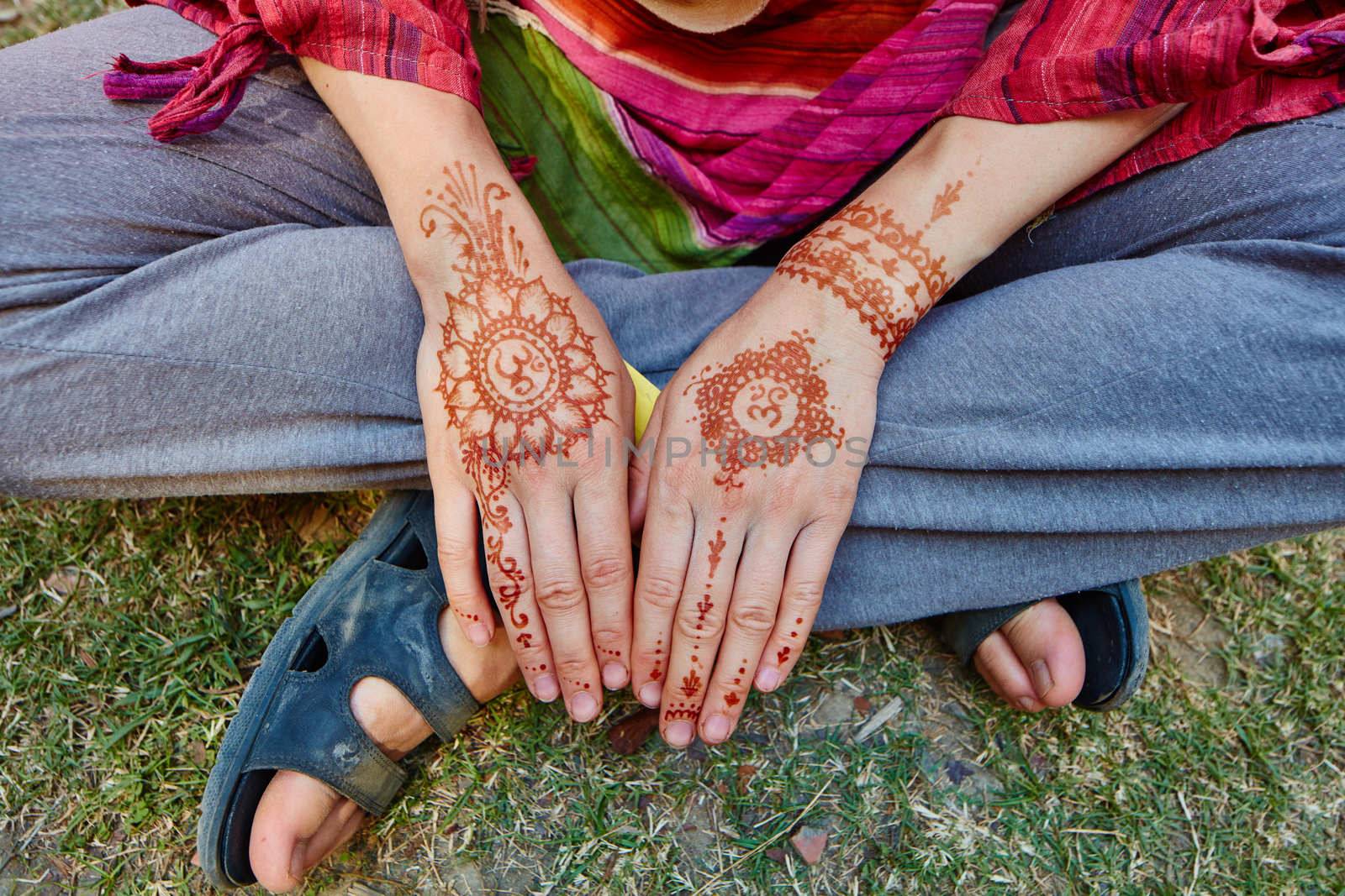 Mehndi on womans arms