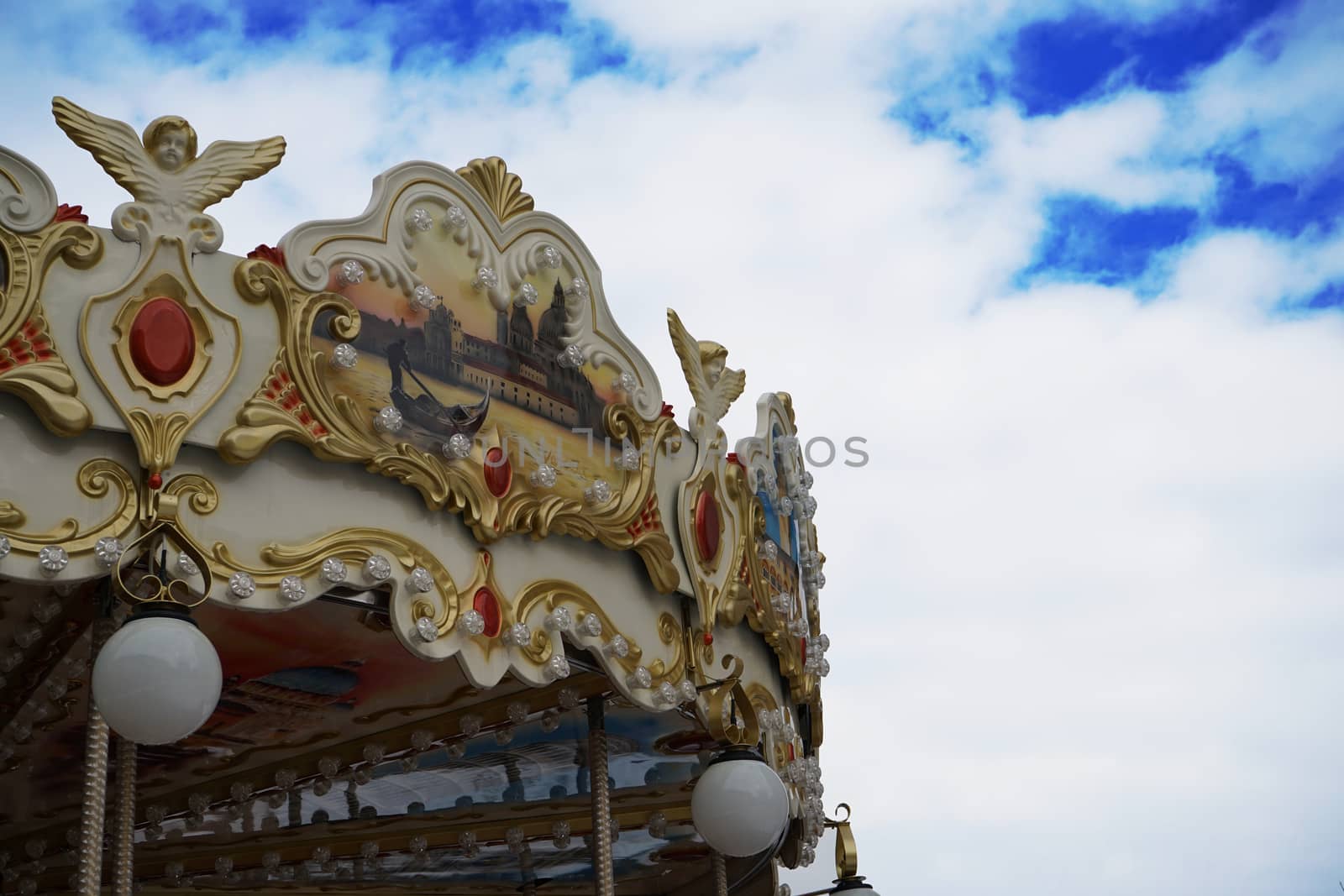 Photo Carousel vintage with Cloudy Blue Sky by Gioconte