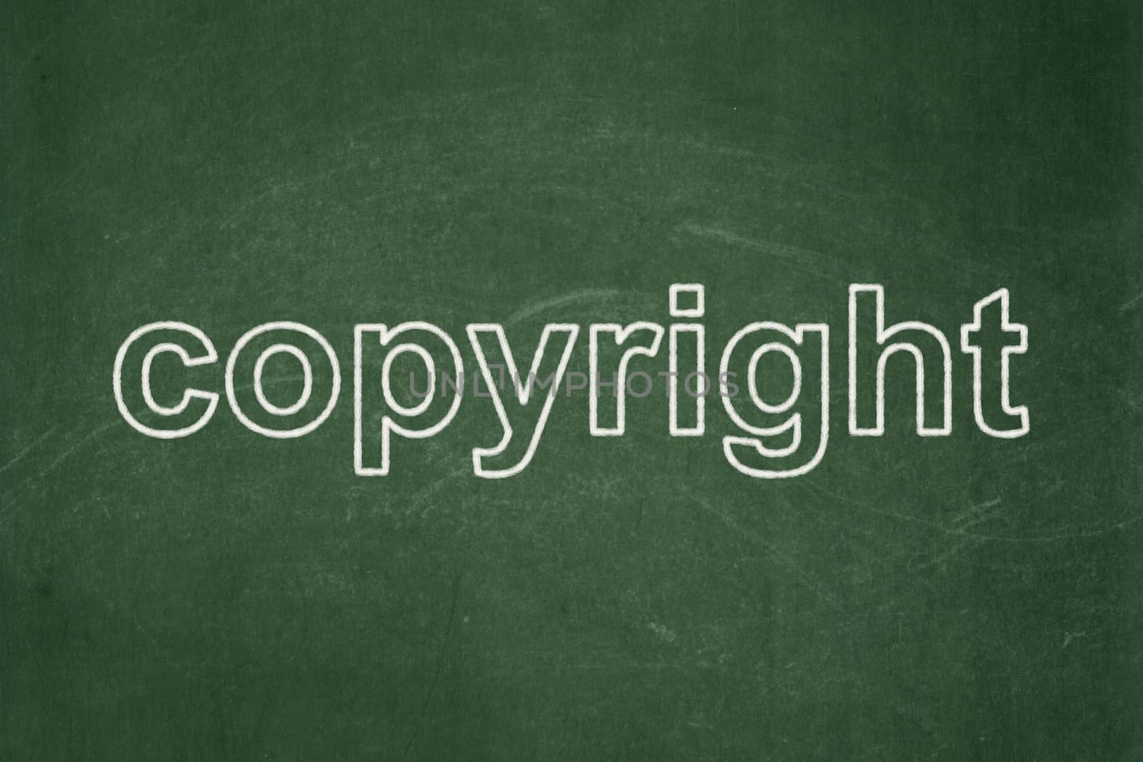 Law concept: text Copyright on Green chalkboard background