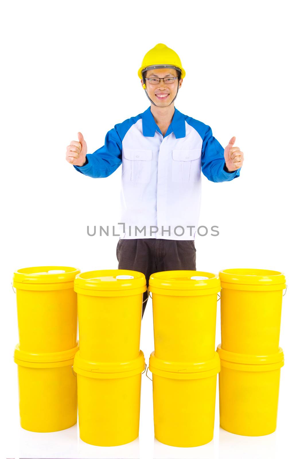 Lubricant oils and greases distributor with suit hardhat showing thumb-up, isolated on white background.