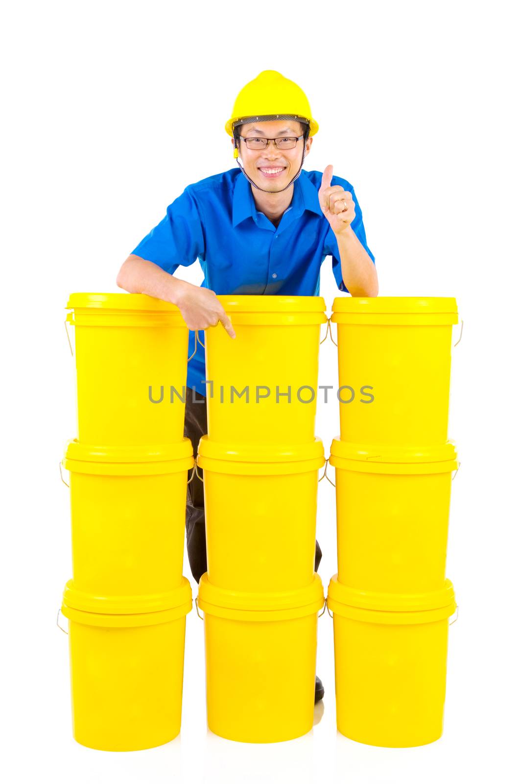 Lubricant oils and greases distributor with suit hardhat showing thumb-up, isolated on white background.