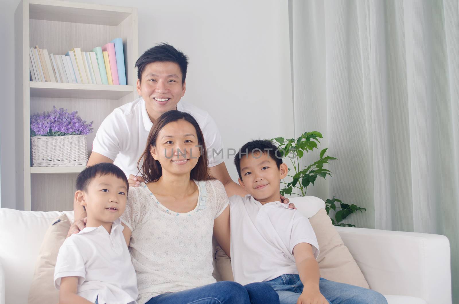 Indoor portrait of asian mixed race family