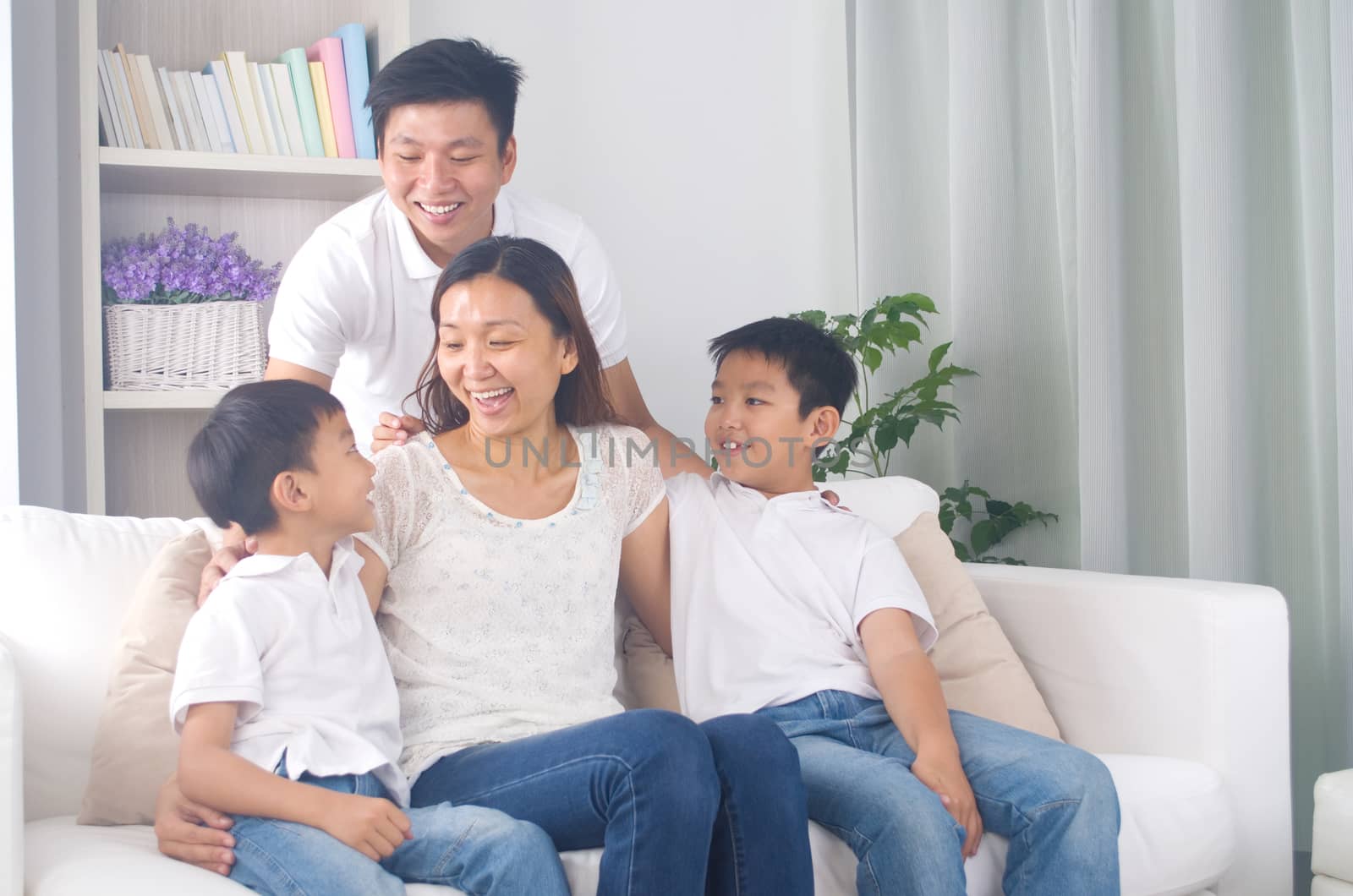 Indoor portrait of asian mixed race family