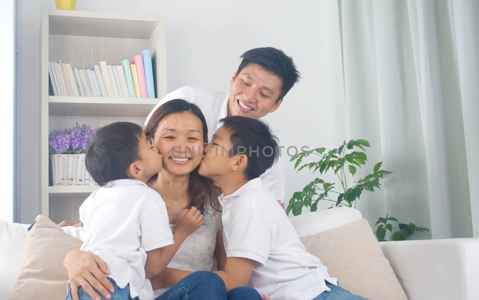 Asian family having fun at home