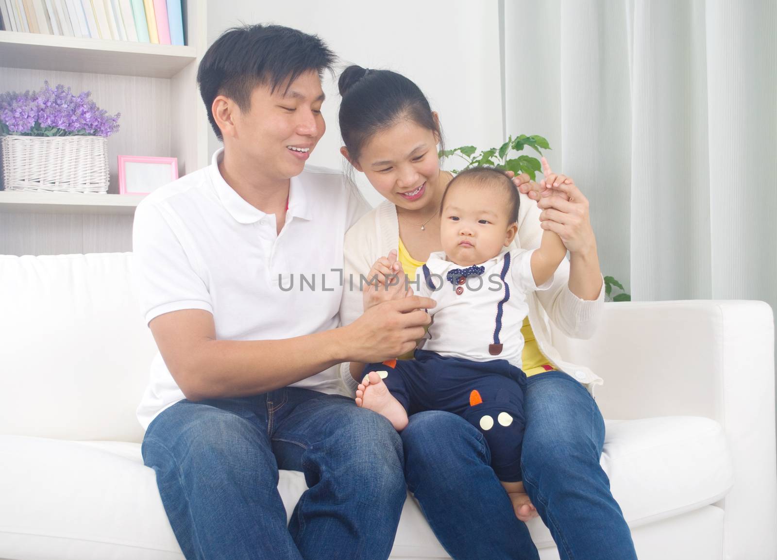 Indoor portrait of asian family