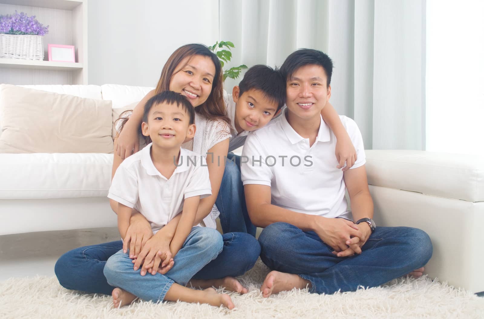 Indoor portrait of asian mixed race family