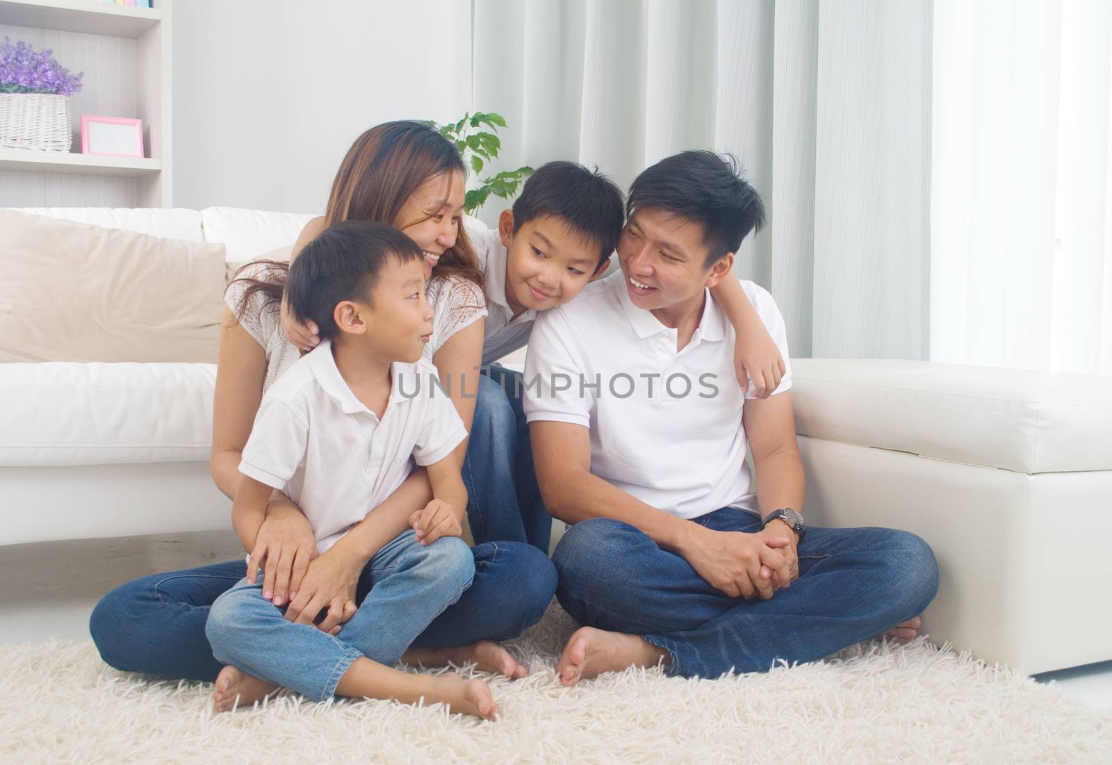 Indoor portrait of asian family