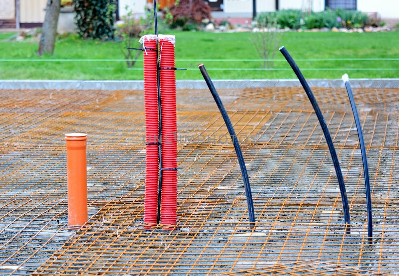 Plastic Conduits Installed in new Building House Foundations. Water, Sewer and Electric Conduits.  