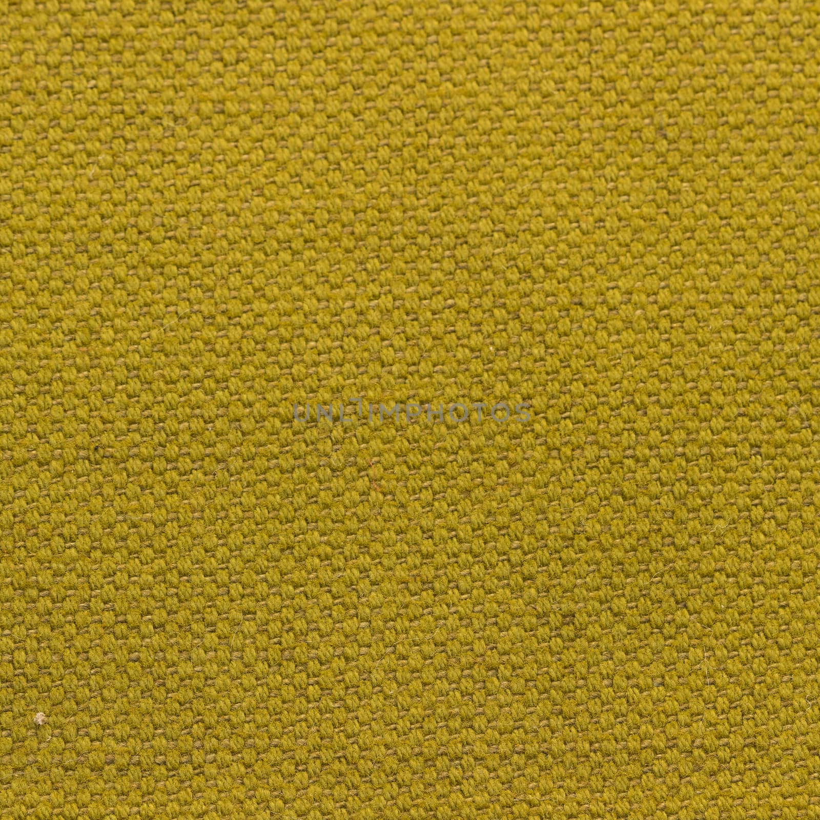 Rustic canvas fabric texture in mustard color. Square shape
