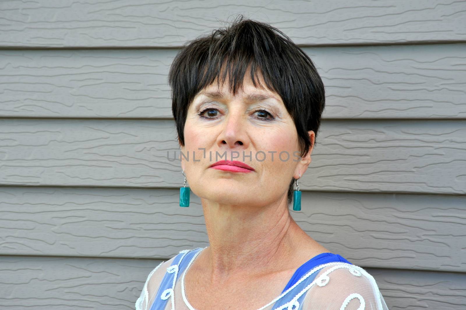 Mature female beauty expressions outside.