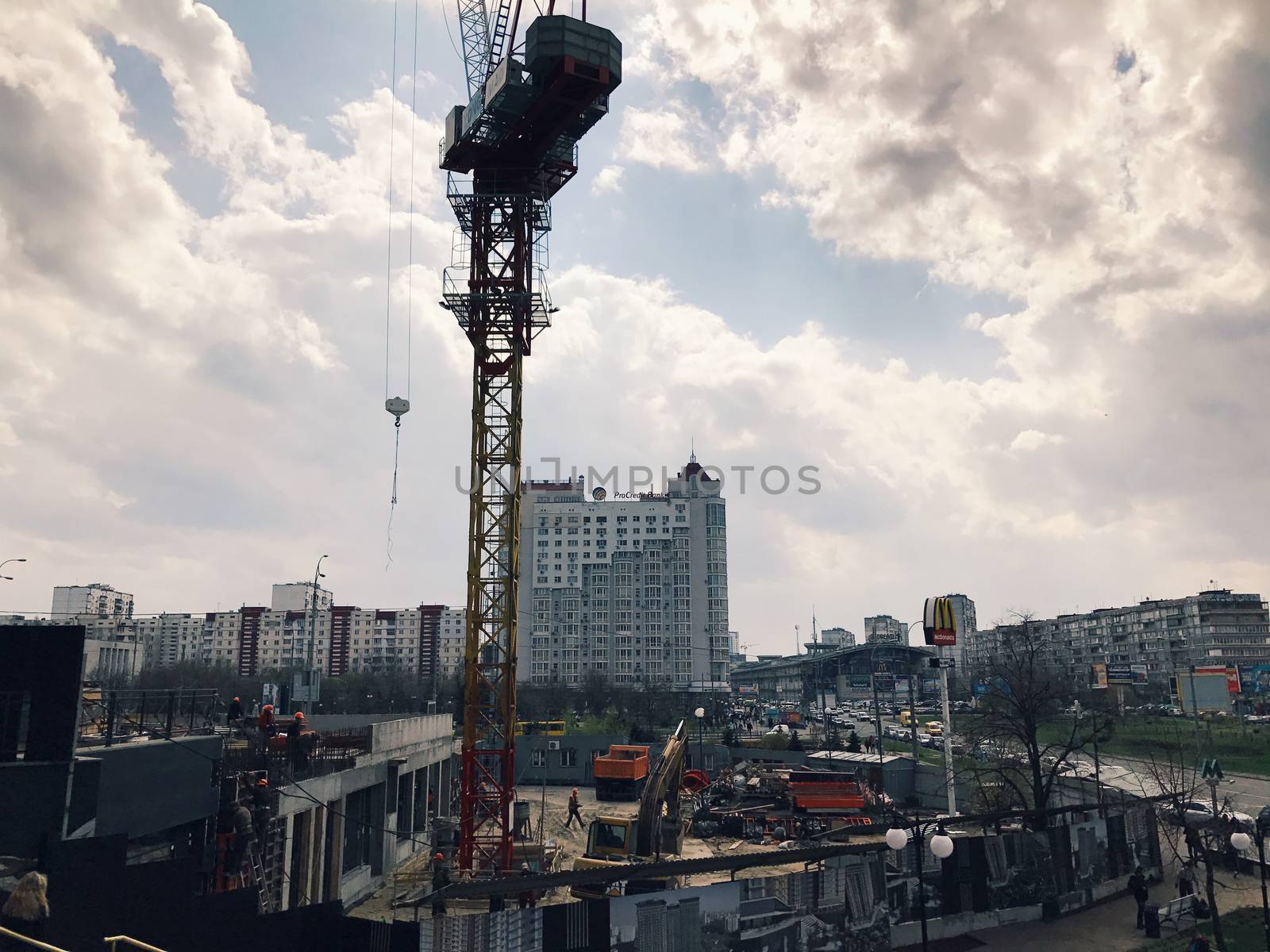 Kiev, Ukraine - April 05, 2017: Construction industry engineers works in a big city Urban cityscape