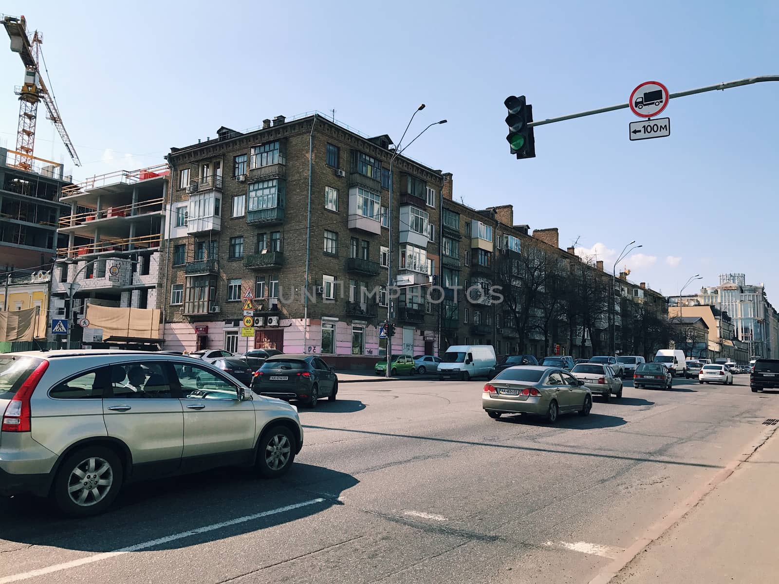 Kiev, Ukraine - April 04, 2017: Traffic in a big city on a bridge cityscape