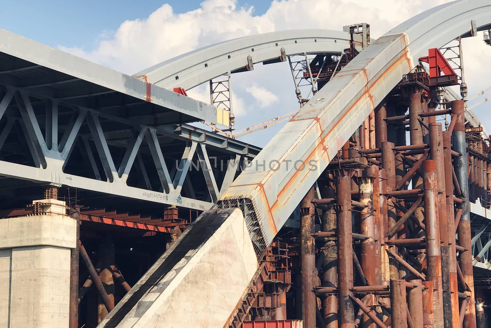 Abandoned old bridge, big engineering construction with metal concrete