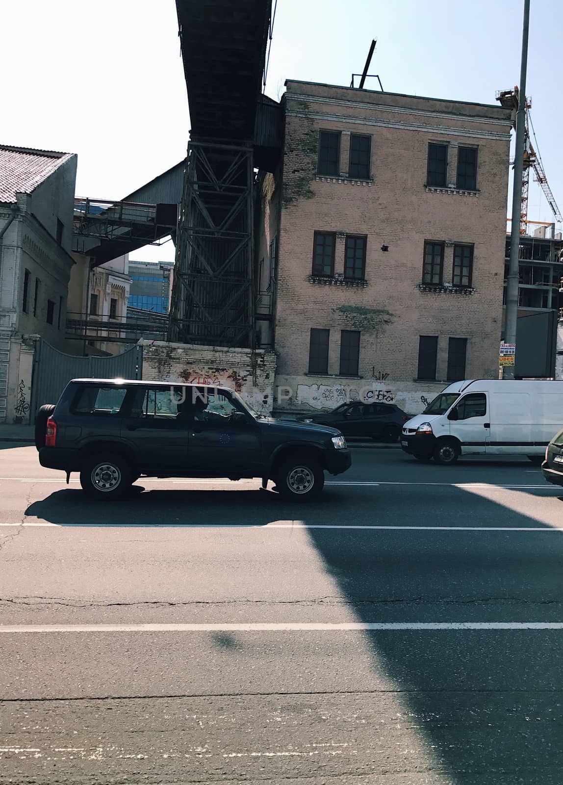 Traffic in a big city on a bridge cityscape