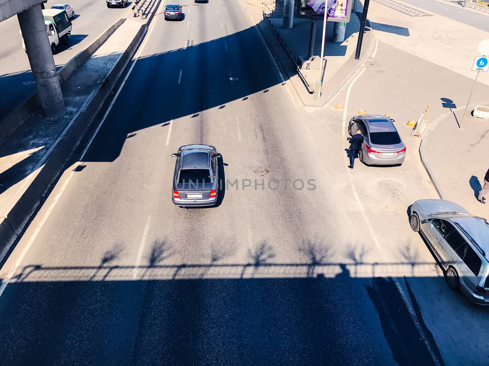 Traffic in a big city on a bridge cityscape