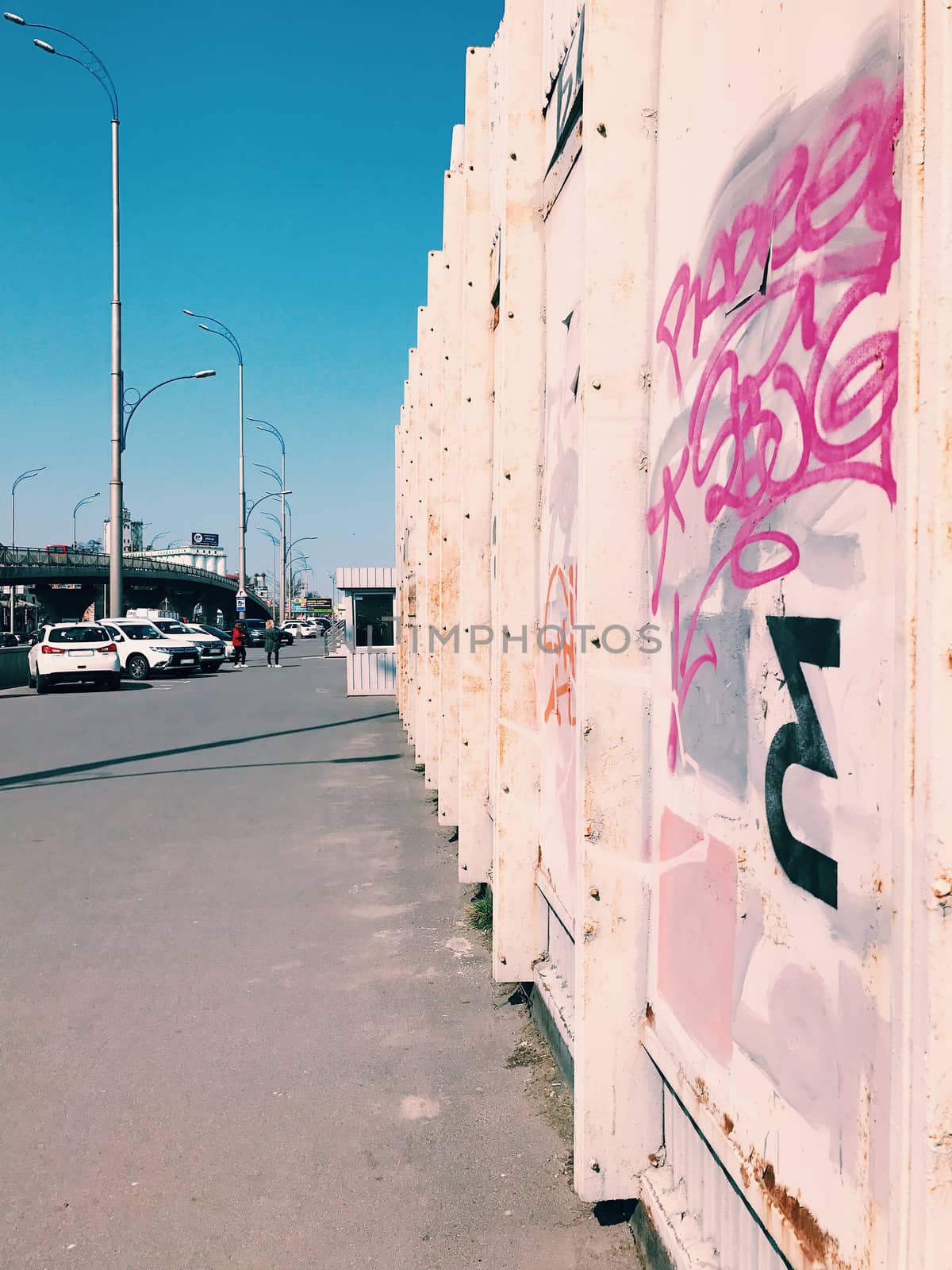 Street art wall, graffiti in a big city on bridge by Softulka