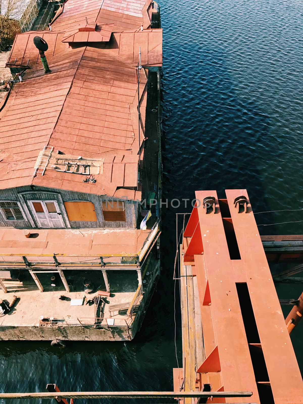 Rusty vintage abandoned ship ferry in old port