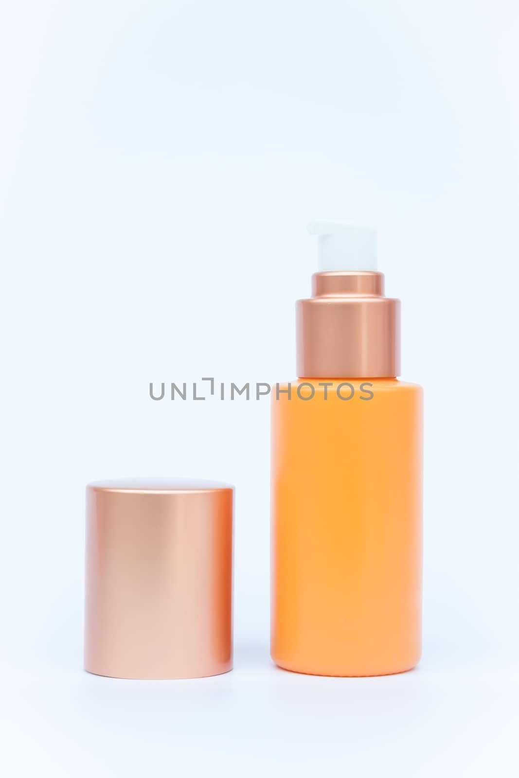 Cosmetic bottle isolated on white background by punsayaporn