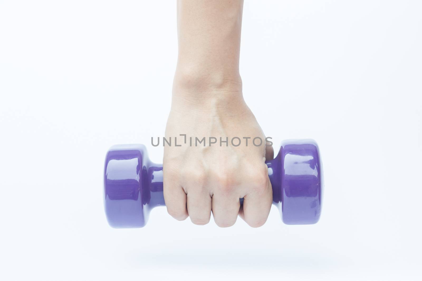 Woman hand holding dumbbell weight isolated on white background by punsayaporn