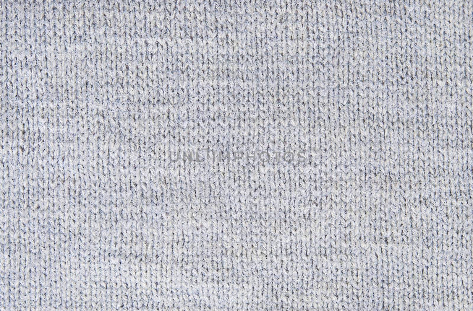 Background small pattern of gray wool knitting yarn by Cipariss