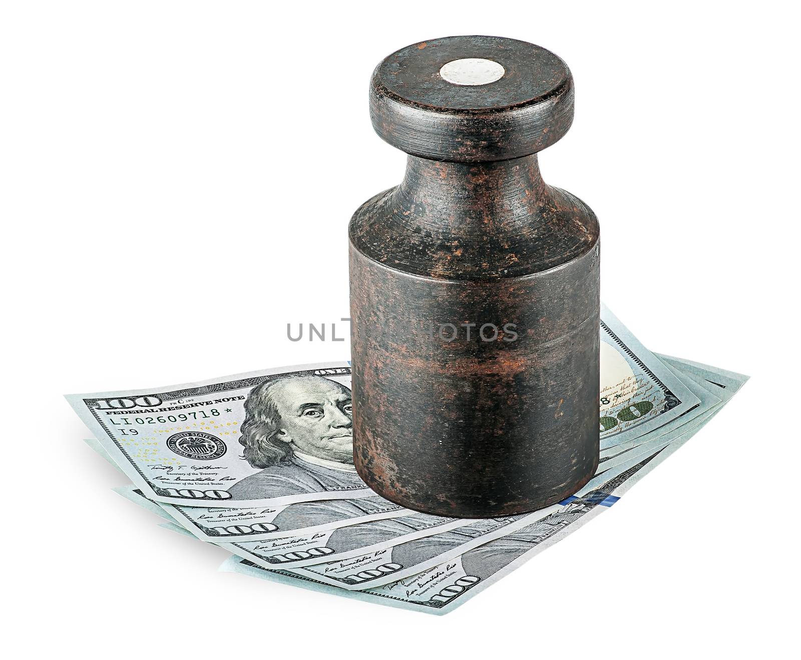 Banknotes clamped old rusty weights isolated on white background
