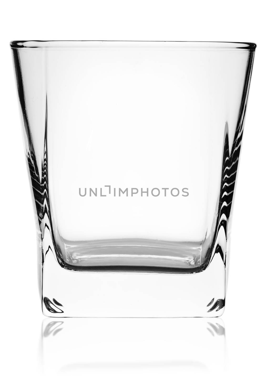 Empty glass for whiskey isolated on white background