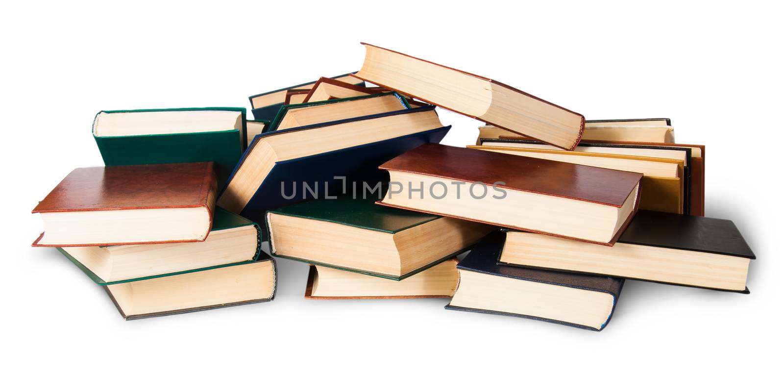 In front piled on a bunch of old books isolated on white background