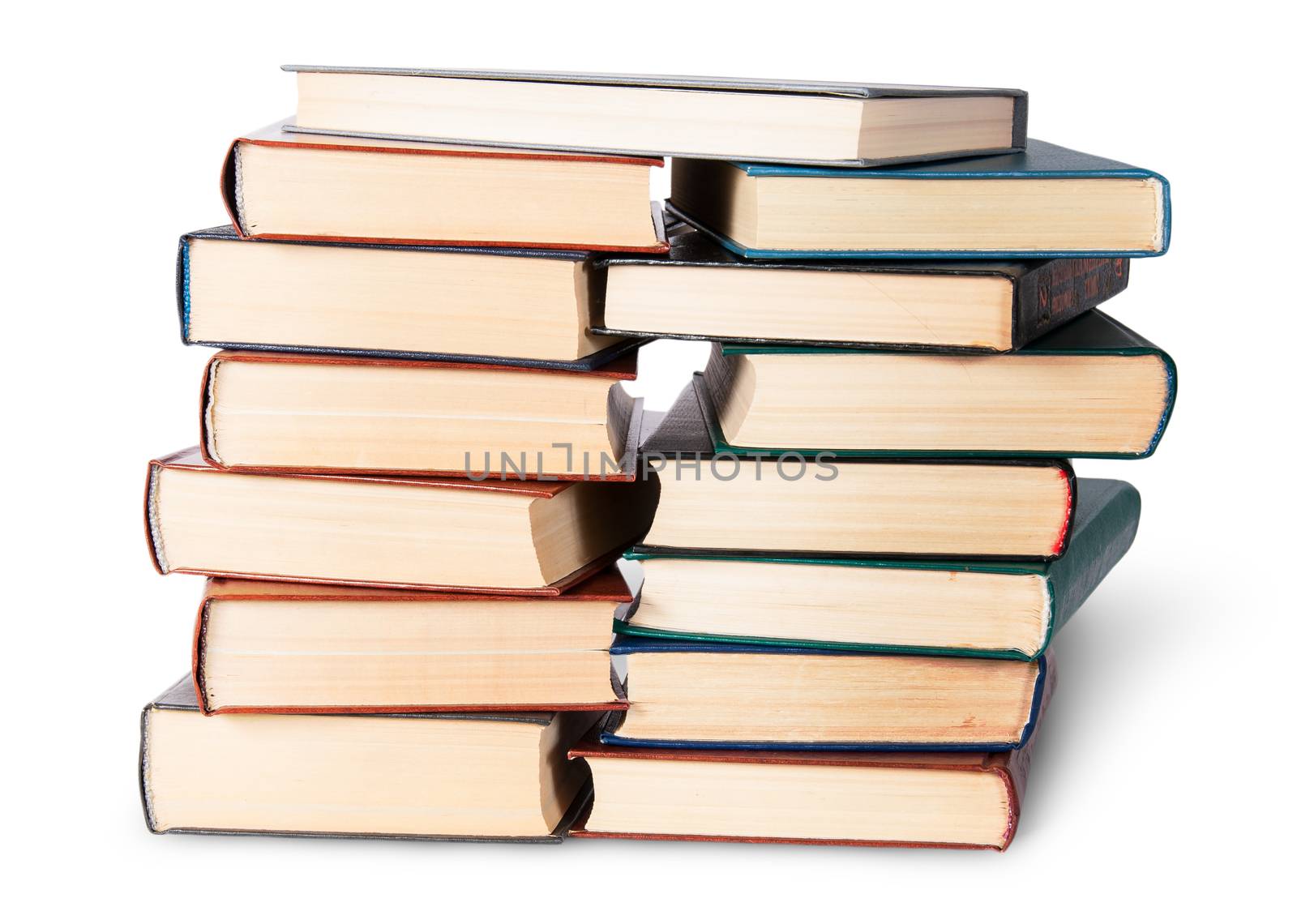 In front two stacks chaotically stacked old books isolated on white background