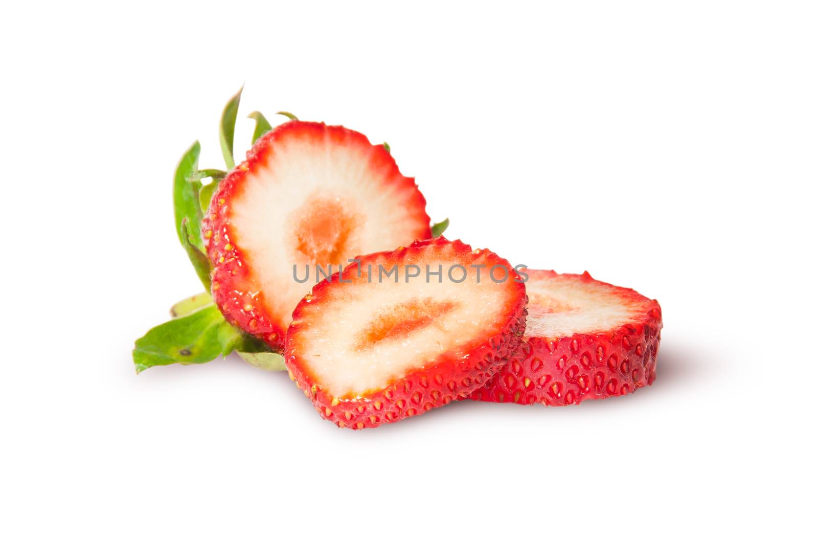 Juicy ripe strawberries sliced isolated on white background