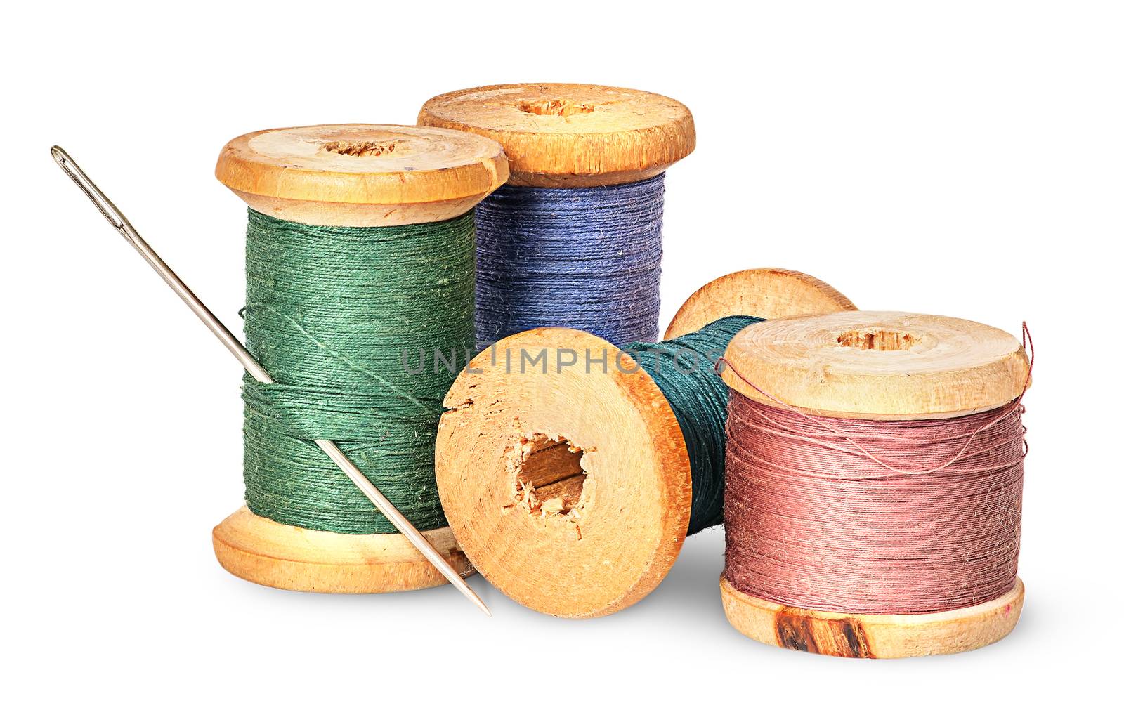 Needle and multicolored thread on wooden spool by Cipariss